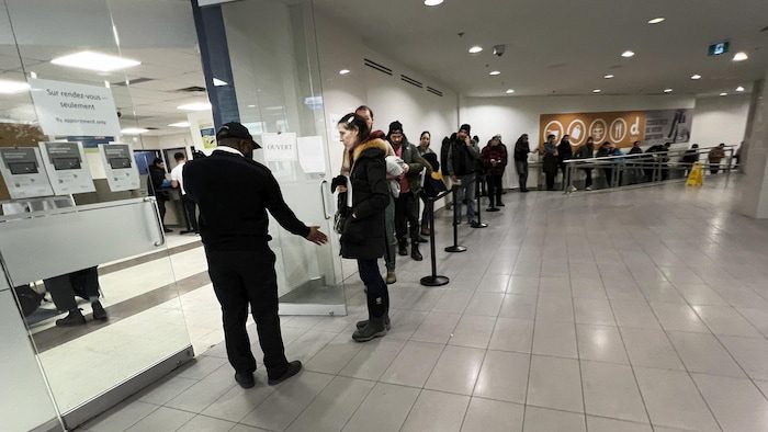 A long queue in front of the SAAQ offices on Place Dupuis in Montreal on the morning of March 6.