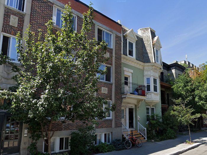 August 2022 image via Google Street View of a two-unit heritage building in Montreal.