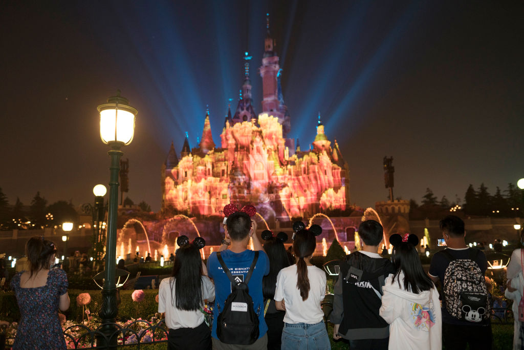 Tourists at Shanghai Disneyland on May 11.