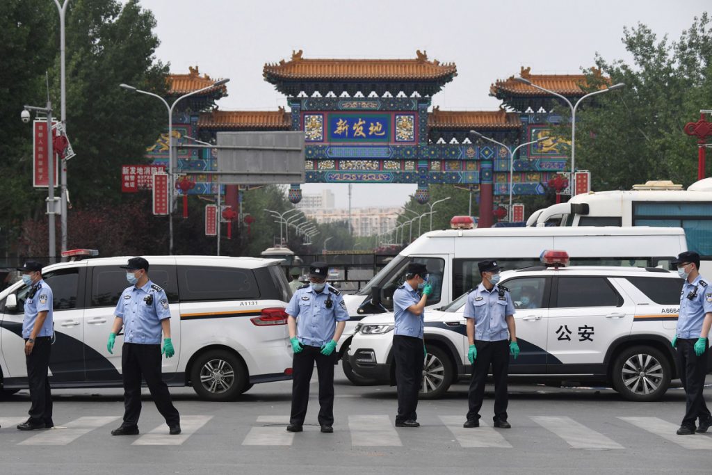 Beijing closes market after new coronavirus cluster emerges