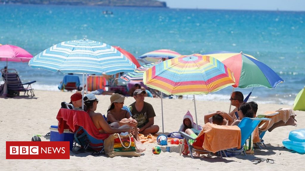 Coronavirus: Spain welcomes tourists back as emergency ends