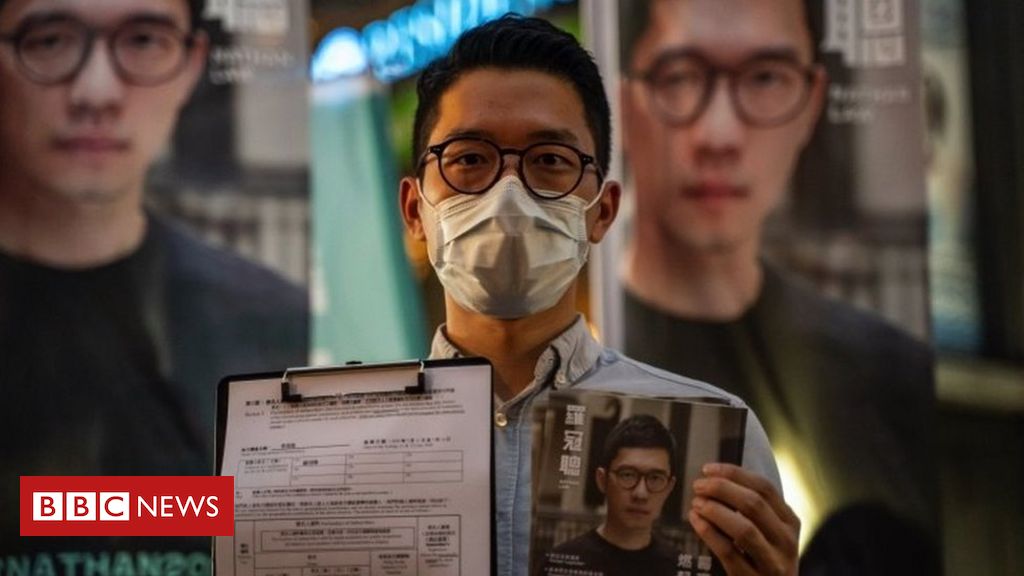 Nathan Law: Prominent democracy activist flees Hong Kong