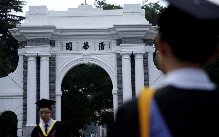 Students outside Beijing's prestigious Tsinghua University where Xu Zhangrun is a law professor - Reuters