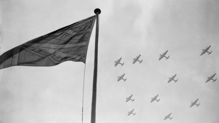 Bomber Command Lancasters, which took the war to the heart of Nazi Germany, fly in formation over the Union Jack.
