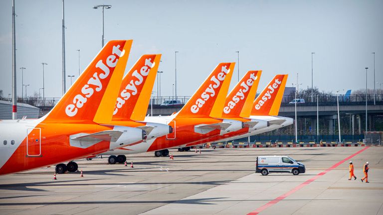 HAARLEMMERMEER, NETHERLANDS - 02 APRIL: Easyjet airplanes parked at Schiphol airport that closes piers and gates and downsizes the airport to the core of Schiphol during the Coronavirus COVID-19 crisis on April 02, 2020 in Haarlemmermeer, Netherlands. (Photo by Patrick van Katwijk/Getty Images)
