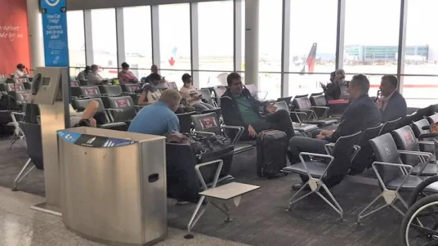 Andrew Scheer spotted without a mask at Toronto's Pearson Airport