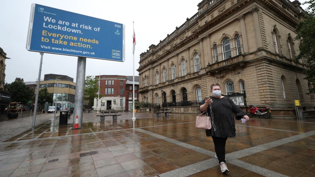 A warning from the government is seen outside Blackburn Town Hall