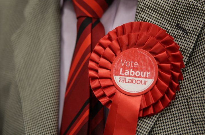 File photo of a man wearing a Labour rosette
