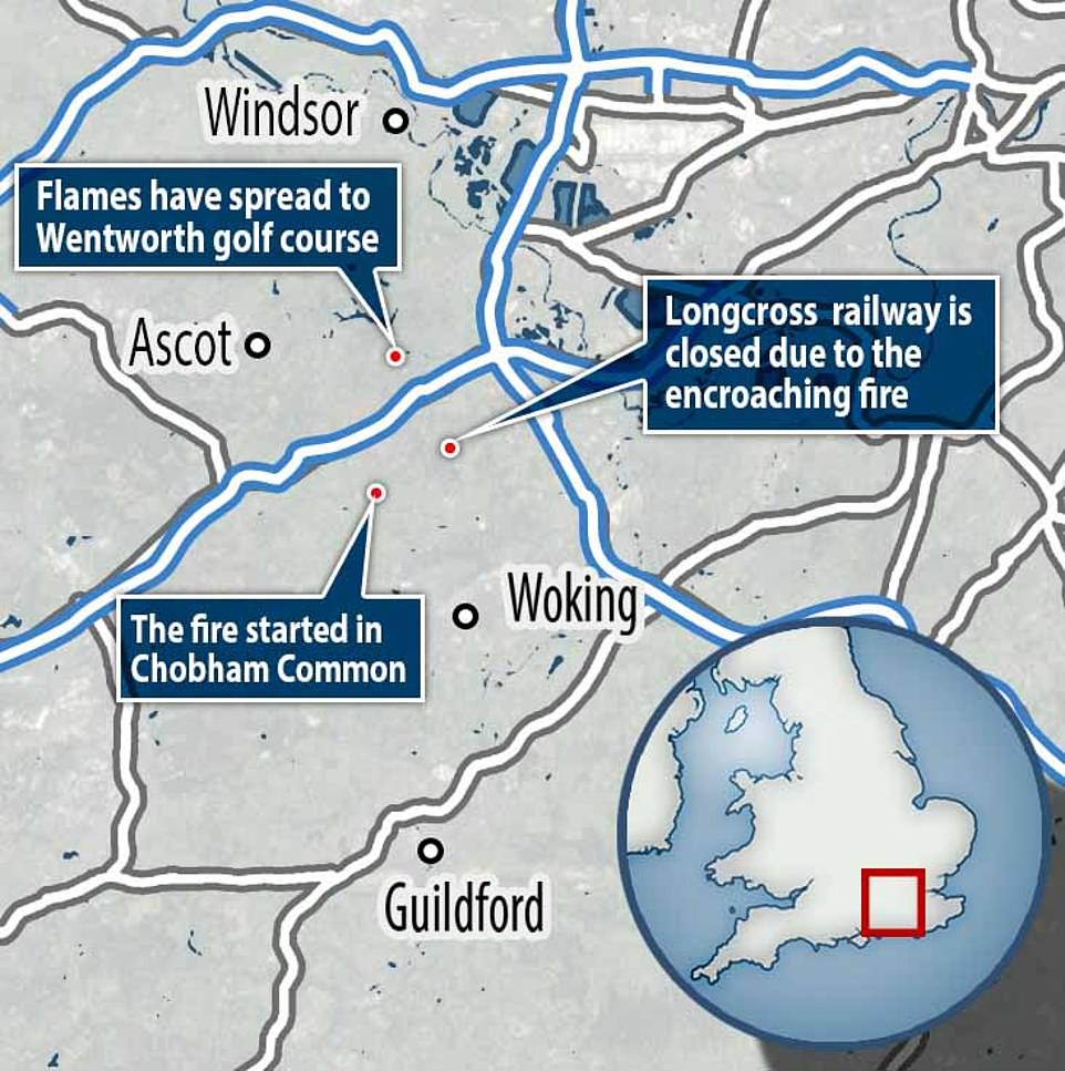 Surrey Fire and Rescue Service told MailOnline no other properties have so far been evacuated while today they sent 25 vehicles to tackle the blaze for a second day