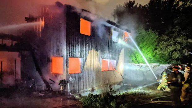 Candles lit during power outage spark house fire