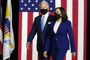 Joe Biden and Kamala Harris arrive to speak at a news conference in Wilmington, Delaware.