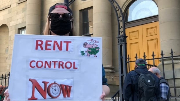 Rally for rent control attracts spectators in downtown Halifax