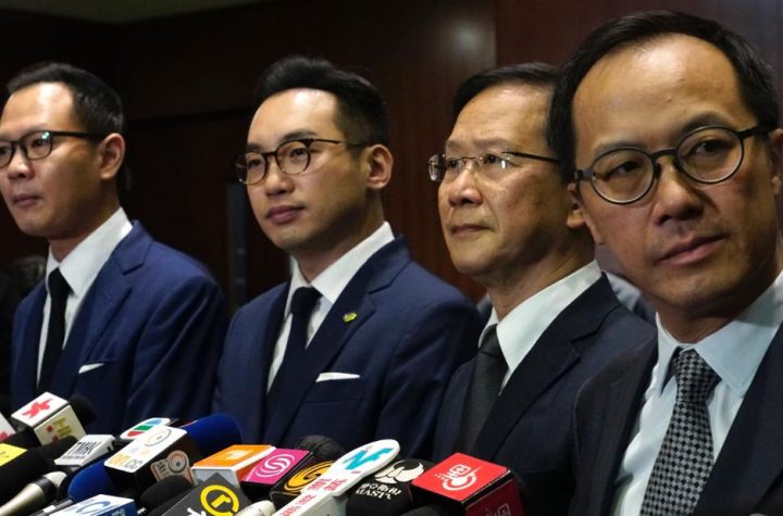 Hong Kong pro-democracy lawmakers have resigned en masse following Beijing rules