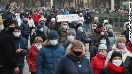 Belarusian opposition supporters wearing face masks rallied in Minsk on November 15 to protest the results of the Belarusian presidential election.