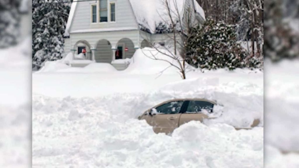 She remained in her car buried in the snow for more than 10 hours