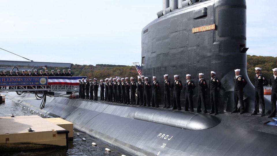 Submarine with crew members.