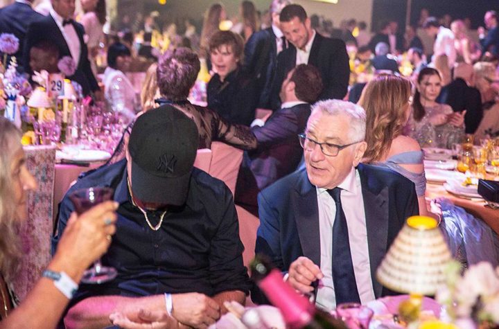 DiCaprio agnostic, in the eyes of De Niro ... at the behind-the-scenes amfAR dinner