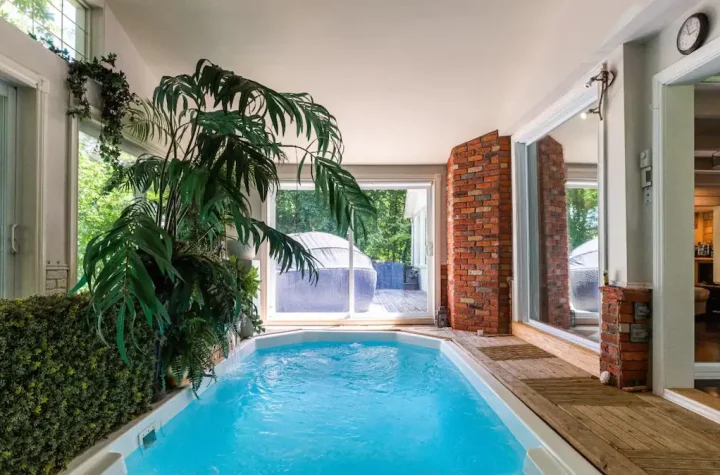 Stunning waterfront house with indoor pool for sale in Laval for $1,199,000