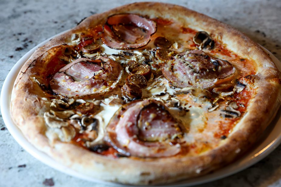 … made with pancetta topped with Waldo peppers, Italian sausages and a mountain of mushrooms…