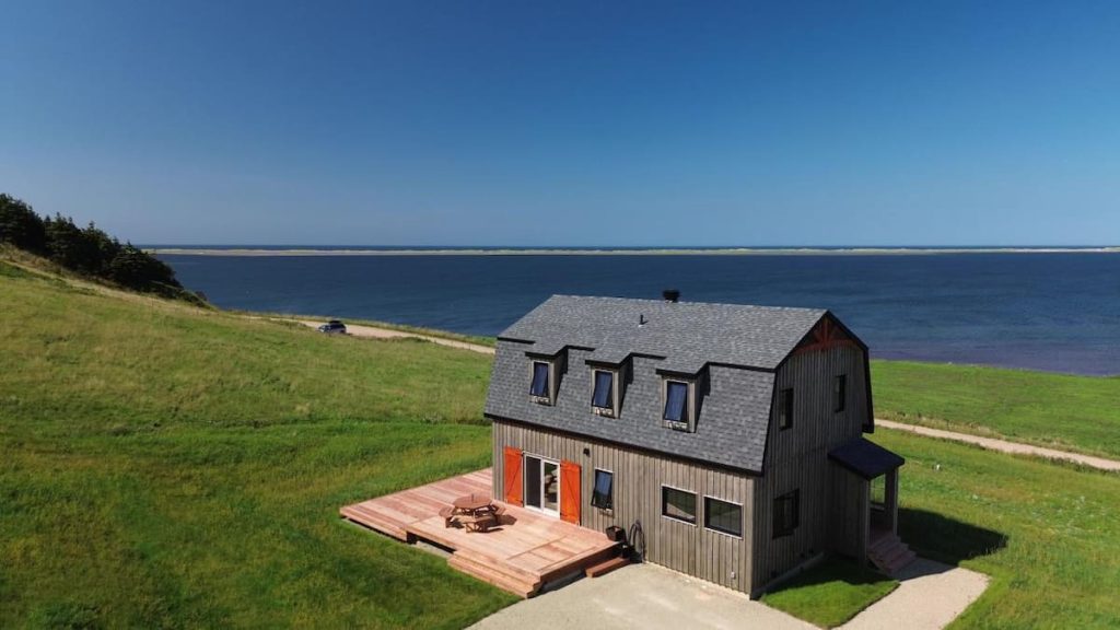 A stunning hillside farmhouse for sale in the Magdalen Islands for $1,350,000