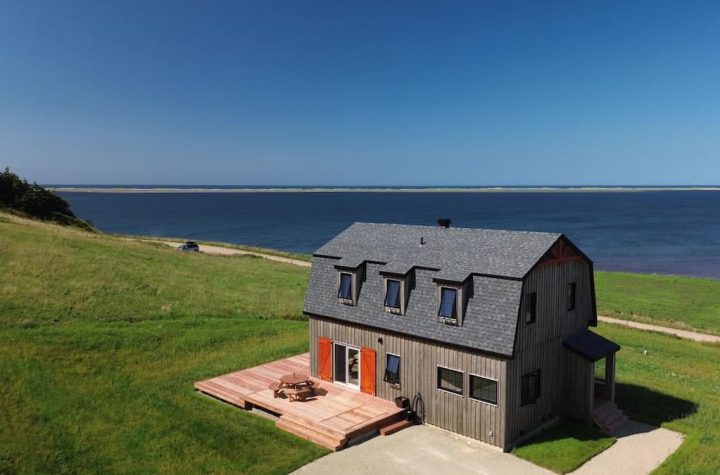 A stunning hillside farmhouse for sale in the Magdalen Islands for $1,350,000