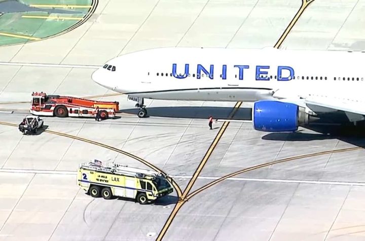 A Boeing 777 makes an emergency landing after a flat tire