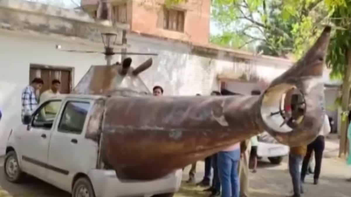 An inventor has his homemade "helicopter car" confiscated